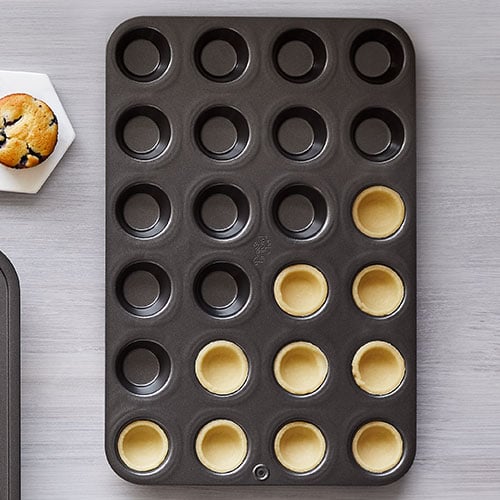 Pampered Chef - The Mini Muffin Pan will help you make 24 of your favorite  two-bite muffins, cupcakes, tarts or appetizers at a time