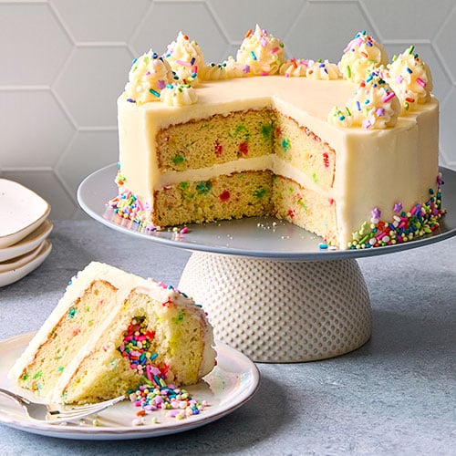 Rainbow Pinata Cake (Eggless) - Ovenfresh