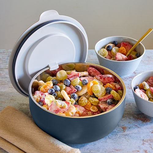 It's the cup slicer from pampered chef!! Make a quick fruit salad. @pa, fruit slicer